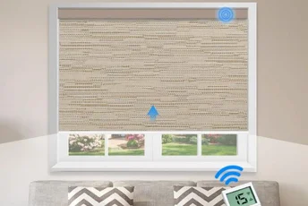 Motorized blinds covering large floor-to-ceiling windows.