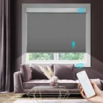 gray motorized blinds installed in a stylish room