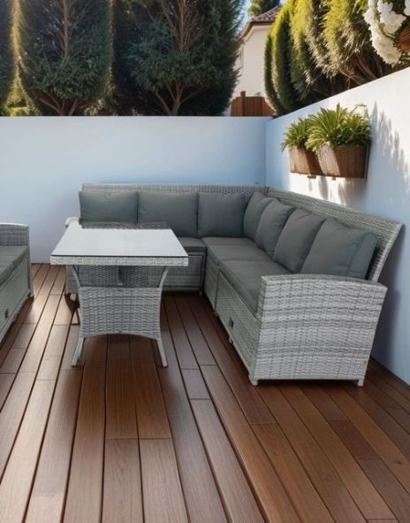 Modern outdoor corner sofa set in a garden