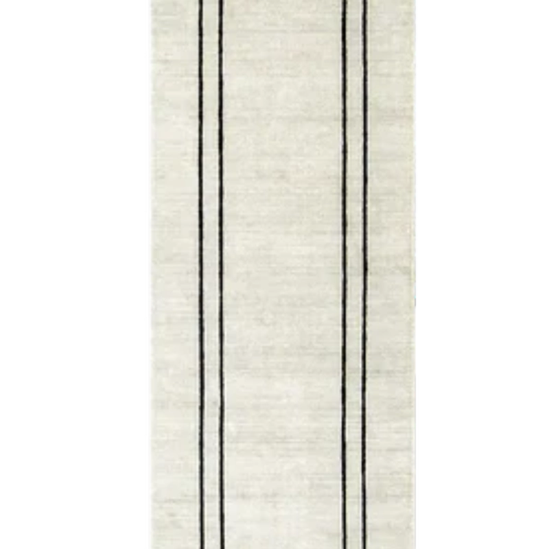 Pearl rug with a bold black border