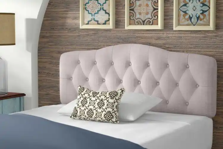Custom upholstered headboard for luxury beds.